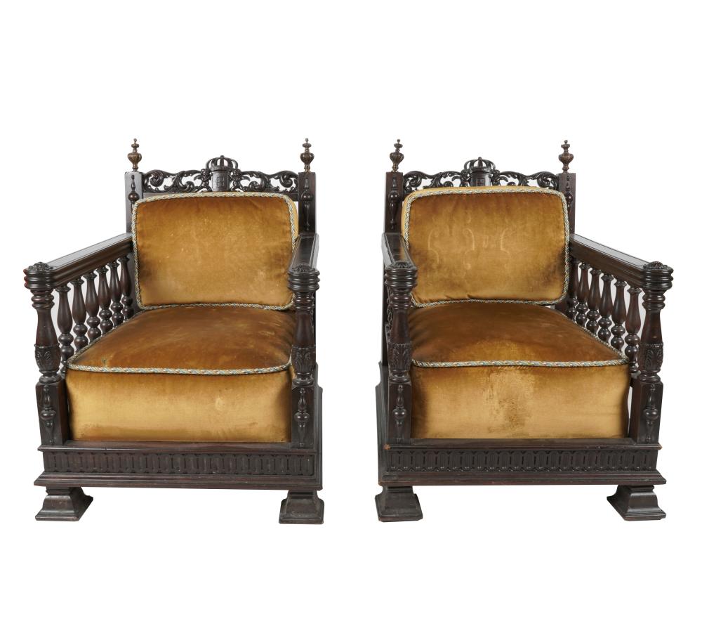 Appraisal: PAIR OF RENAISSANCE REVIVAL CARVED ARMCHAIRSmahogany with brass finials Provenance