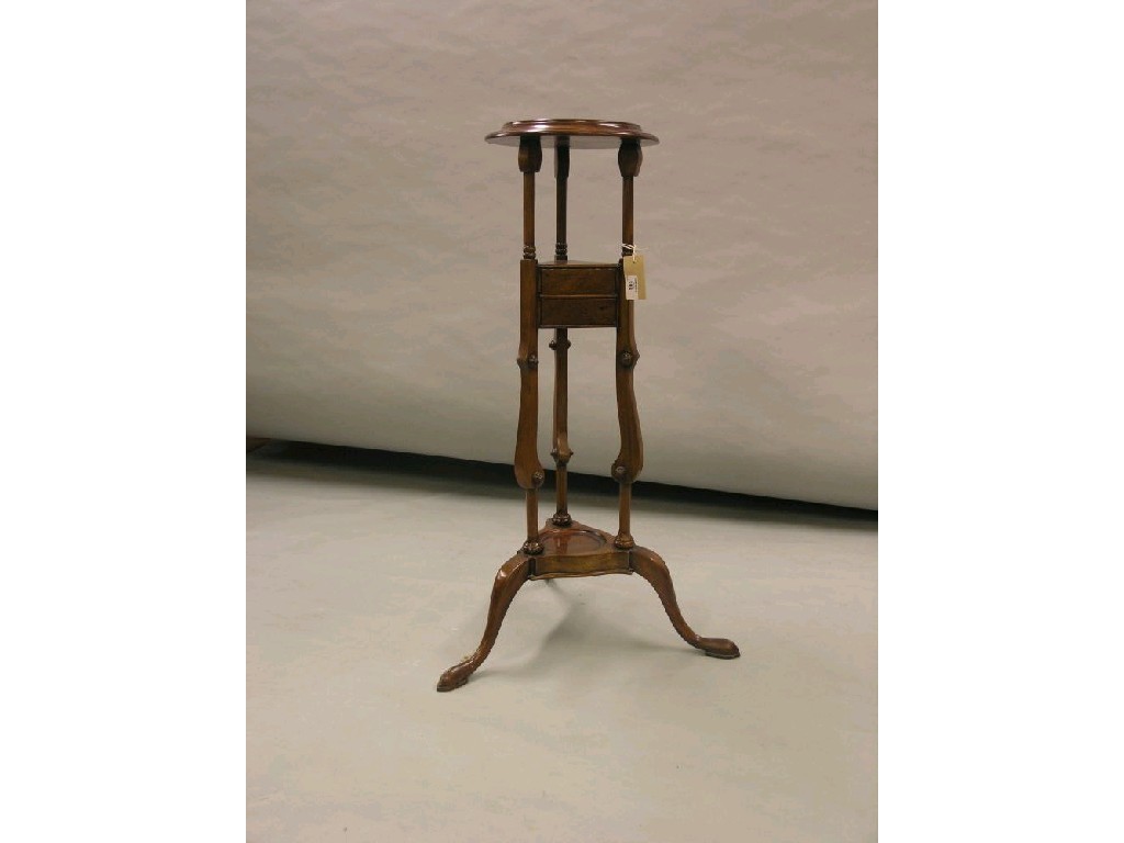 Appraisal: A reproduction mahogany corner fitting wash-stand dished top above single