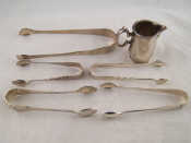 Appraisal: A mixed lot comprising five pairs of silver sugar tongs