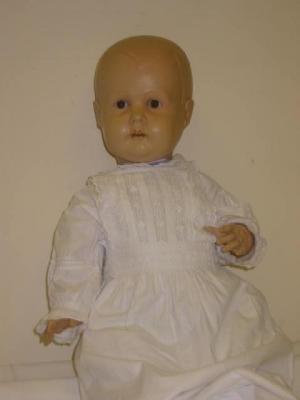 Appraisal: A German celluloid baby doll with fixed brown glass eyes