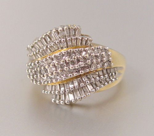 Appraisal: DIAMOND COCKTAIL RING K yellow gold ring with round full