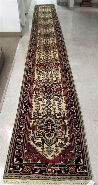 Appraisal: HAND KNOTTED ORIENTAL HALL OR STAIRWAY RUNNER Indo-Persian repeating geometric