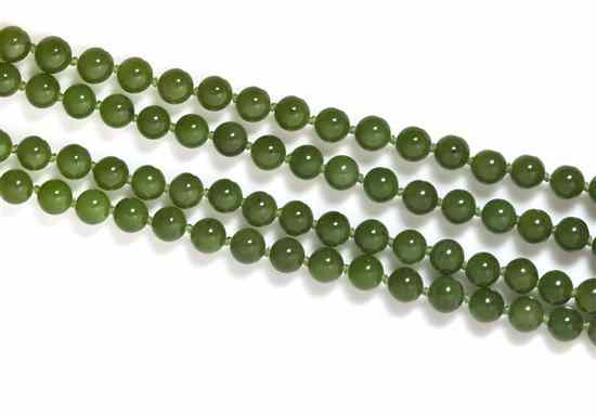 Appraisal: A Single Strand Nephrite Jade Bead Necklace containing jade beads