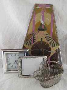 Appraisal: A silver framed mantel clock x cm a silver plated