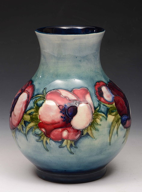 Appraisal: A Moorcroft pale blue ground baluster vasedecorated with anemone impressed