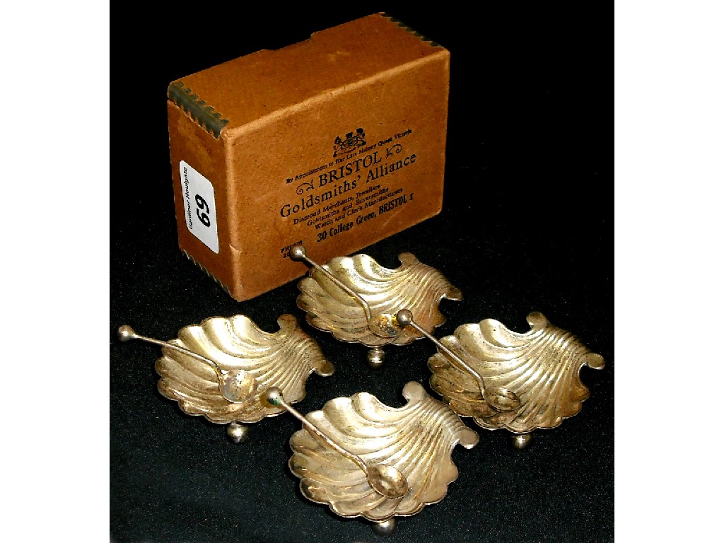 Appraisal: Set of four Edwardian scallop shell salts and spoons Birmingham