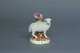 Appraisal: A Staffordshire sheep spill vase cm