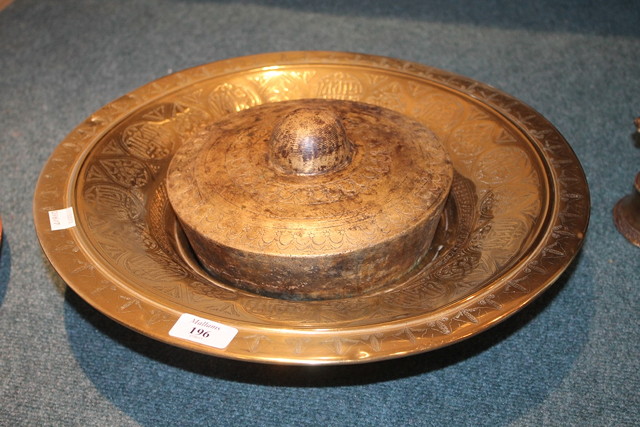 Appraisal: A PERSIAN WHITE BRASS ENGRAVED WASHING BOWL cm and a