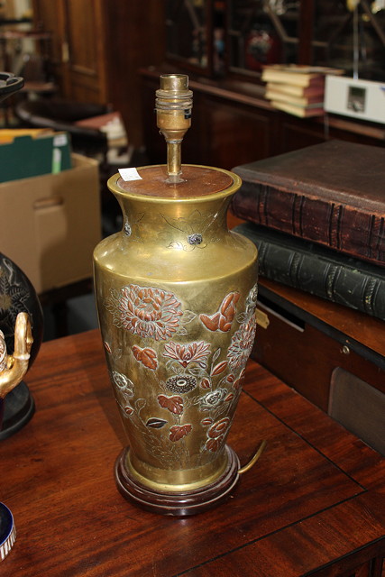 Appraisal: A PAIR OF ORIENTAL POLISHED BRONZE LAMP BASES of baluster