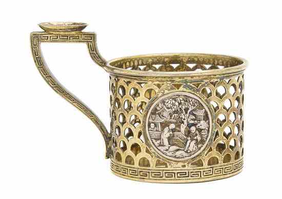 Appraisal: A Russian Silver and Gilt Silver Teacup Holder Sazikov Moscow