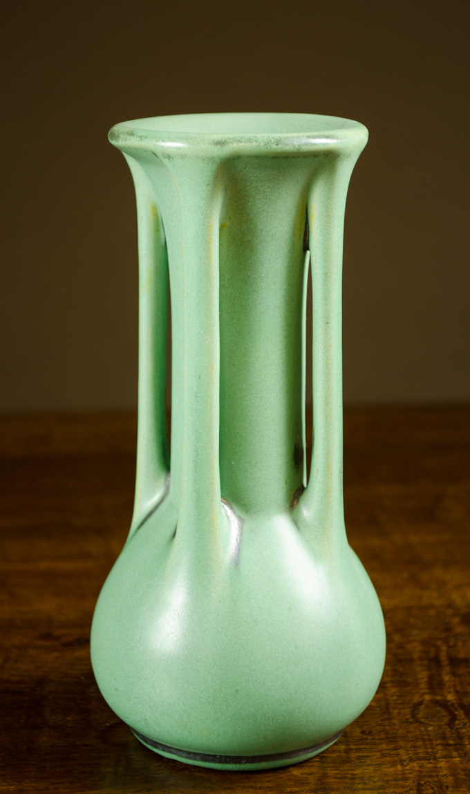 Appraisal: TECO POTTERY BUTTRESS VASE having a green allover matte glaze