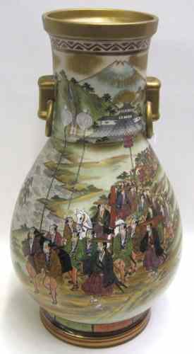 Appraisal: JAPANESE PORCELAIN VASE jar-shaped with stationery ring-form handles hand painted