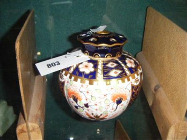 Appraisal: A Royal Crown Derby wrythen pot pourri bowl and cover