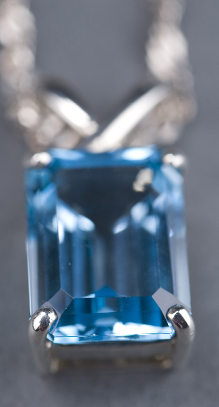 Appraisal: Swiss blue topaz pendant in basket setting on an sterling