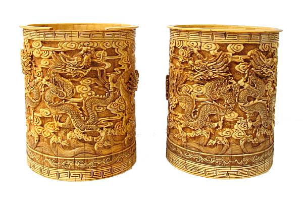 Appraisal: A pair of Chinese carved bone veneer urns height in