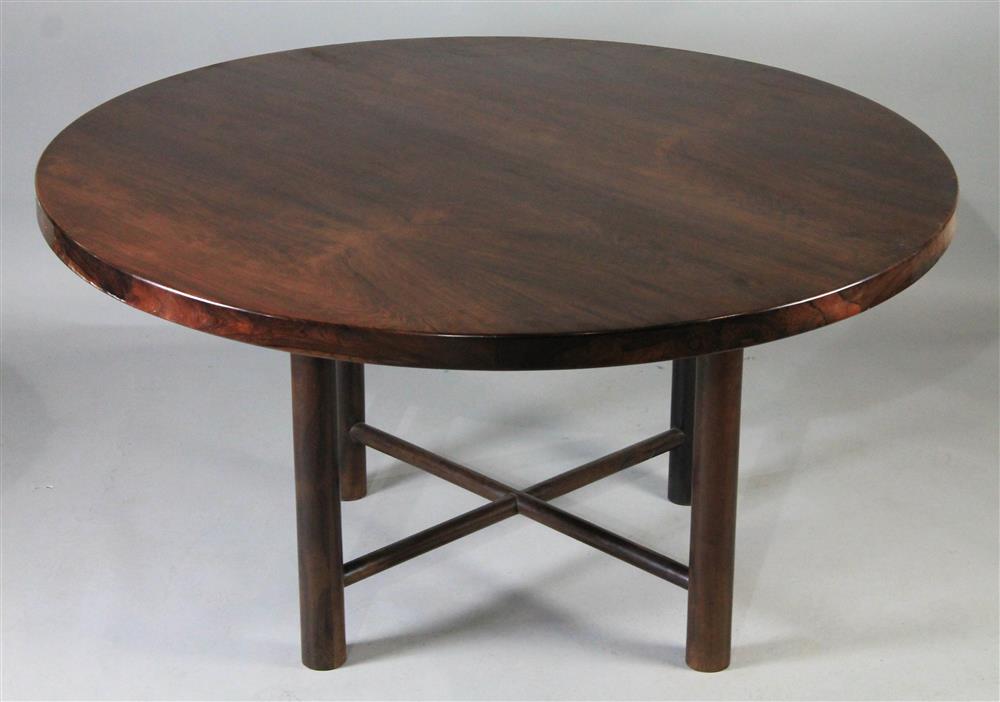 Appraisal: MODERN CIRCULAR ROSEWOOD VENEERED CENTER TABLE having a highly figured