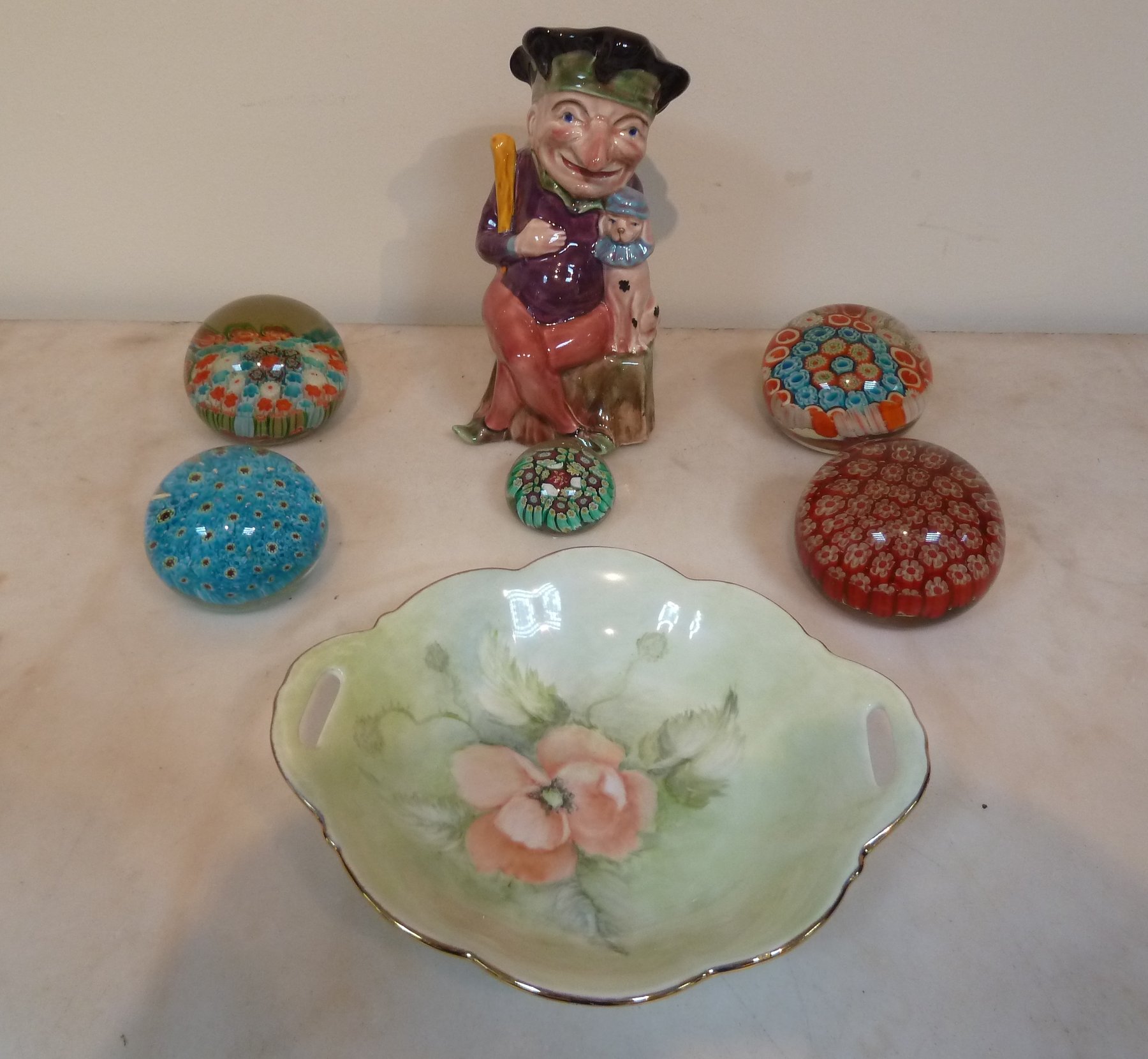 Appraisal: A Melba Ware Mr Punch jug five millefiore paperweights various