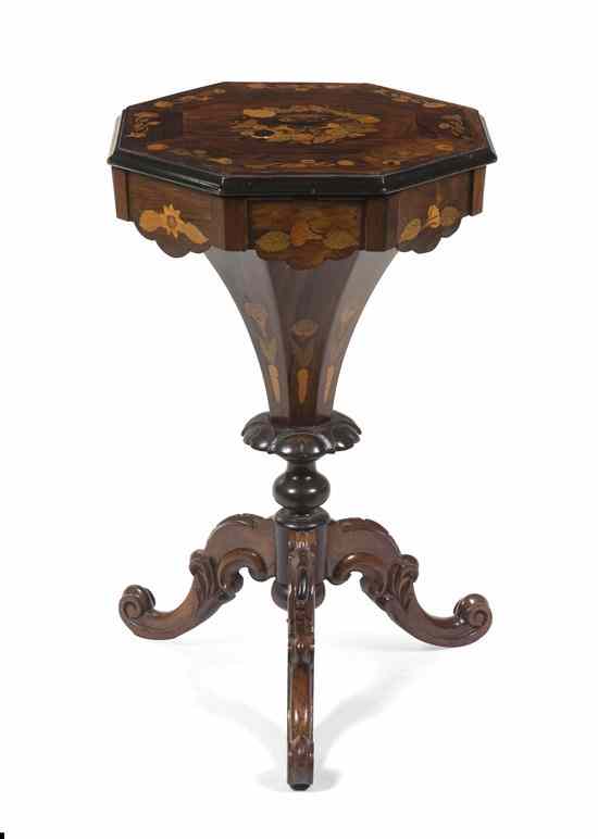 Appraisal: A Victorian Rosewood Marquetry Inlaid Sewing Table having an octagonal