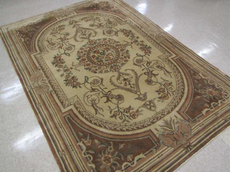 Appraisal: HAND KNOTTED CARPET French Aubusson design floral and central floral