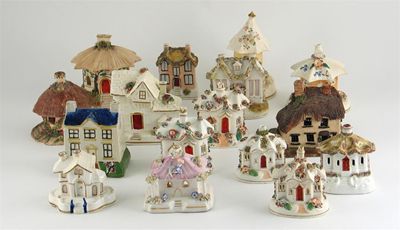 Appraisal: Sixteen various ceramic cottages one with a removable lid Some