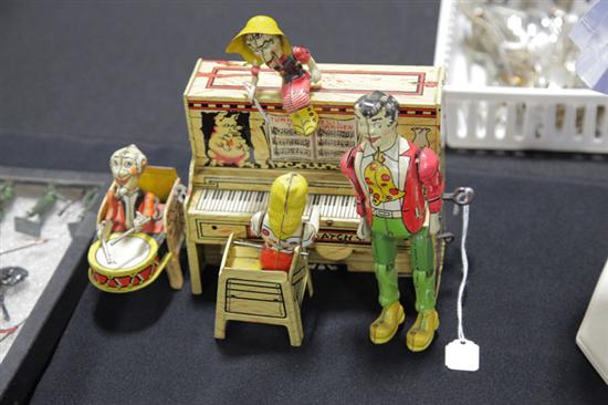 Appraisal: LITTLE ABNER BAND TIN WIND UP TOY Chromolithographed tin toy