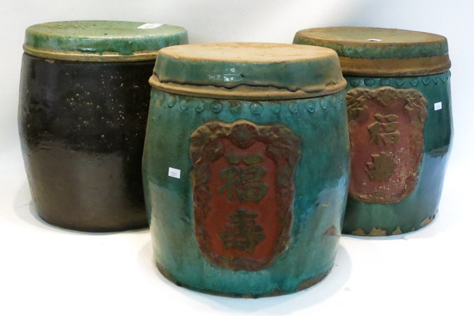 Appraisal: THREE CHINESE POTTERY FOOD STORAGE JARS includes a pair green