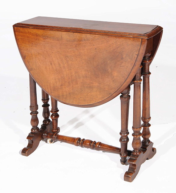 Appraisal: A VICTORIAN MAHOGANY SMALL SUTHERLAND TABLE with turned supports cm