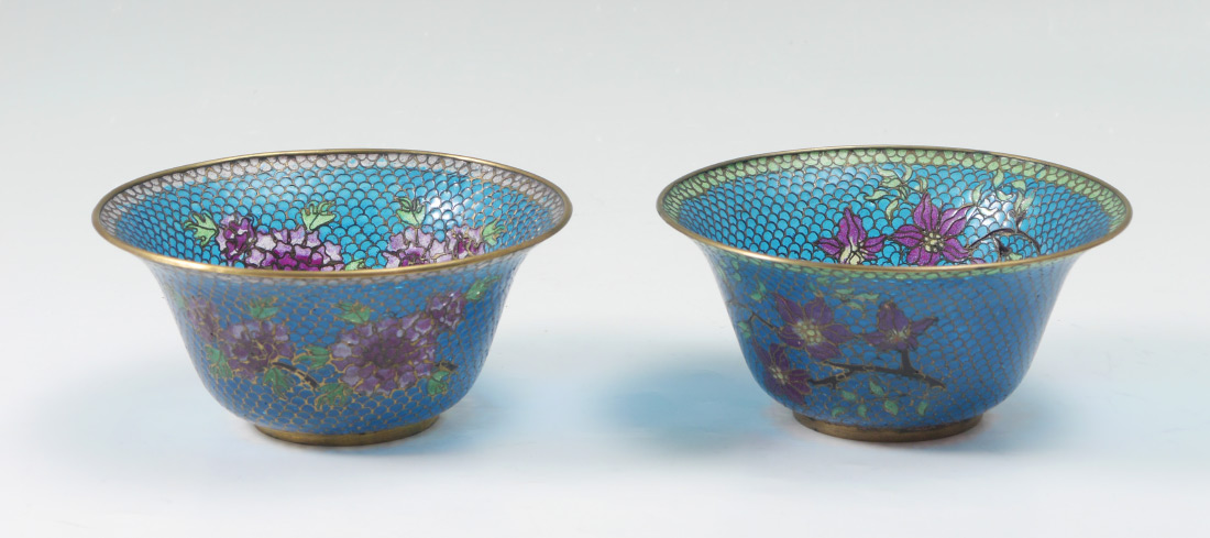 Appraisal: PAIR PLIQUE A JOUR FLORAL BOWLS Gilt metal rim over