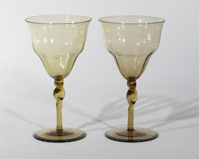 Appraisal: A pair of Powell Whitefriars wine glasses probably designed by