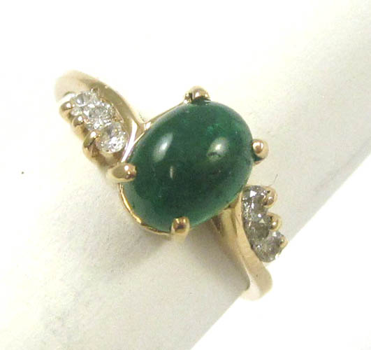 Appraisal: EMERALD DIAMOND AND FOURTEEN KARAT GOLD RING with three round-cut