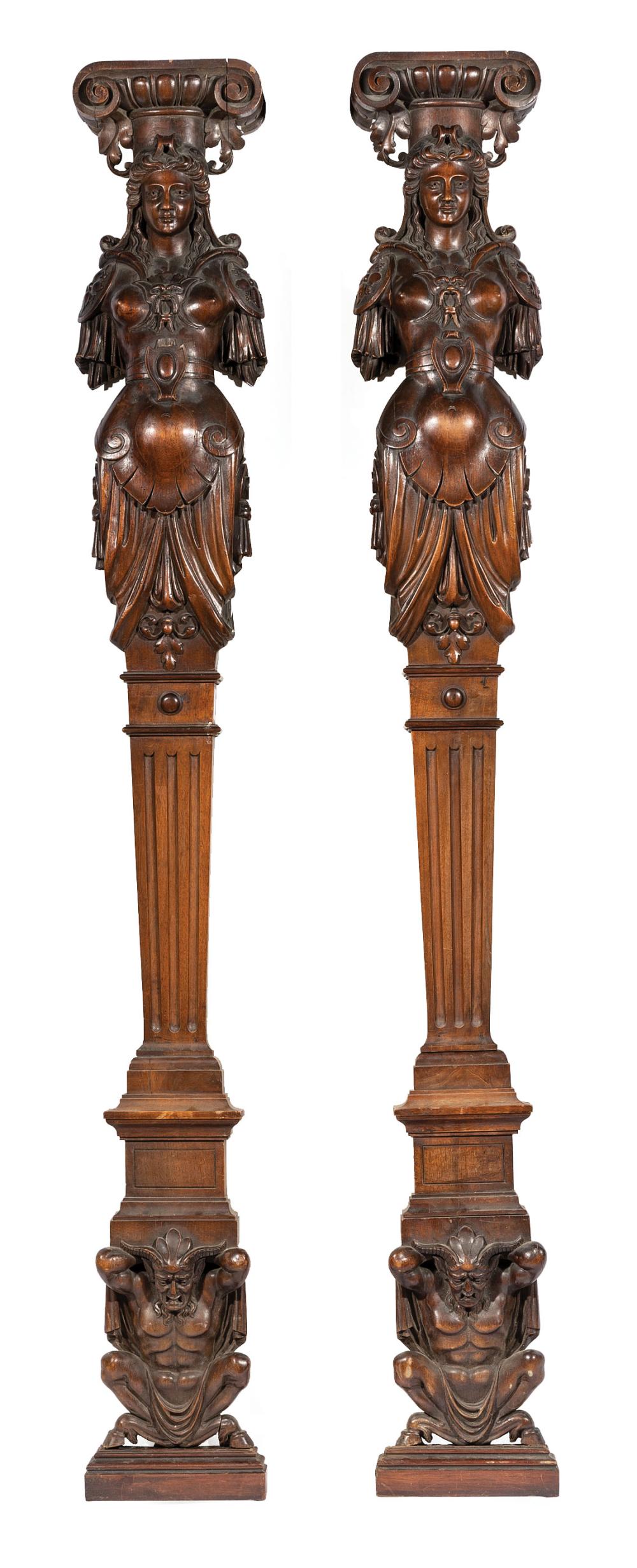 Appraisal: Pair of Continental Carved Walnut Figural Pilasters th c Ionic