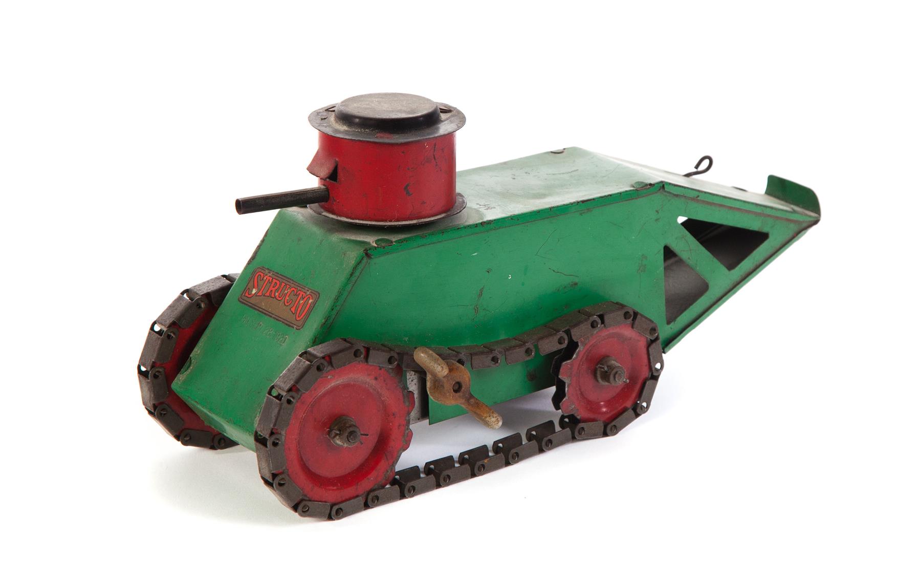 Appraisal: STRUCTO TOYS SPRING-MOVEMENT TANK American patented September Green body red