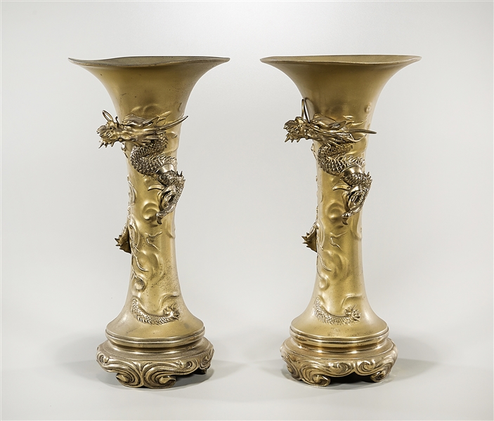 Appraisal: Pair of Chinese metal 'dragon' vases each with wide mouth