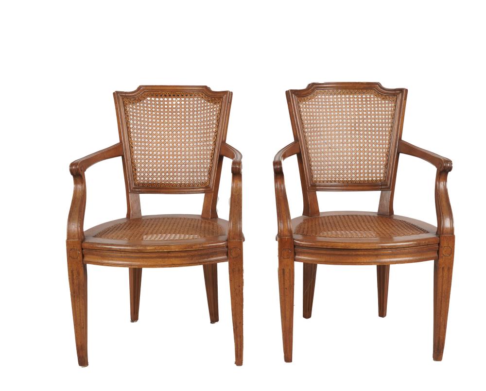 Appraisal: PAIR OF NEOCLASSIC-STYLE CANED FRUITWOOD FAUTEUILSProvenance The Estate of Carol