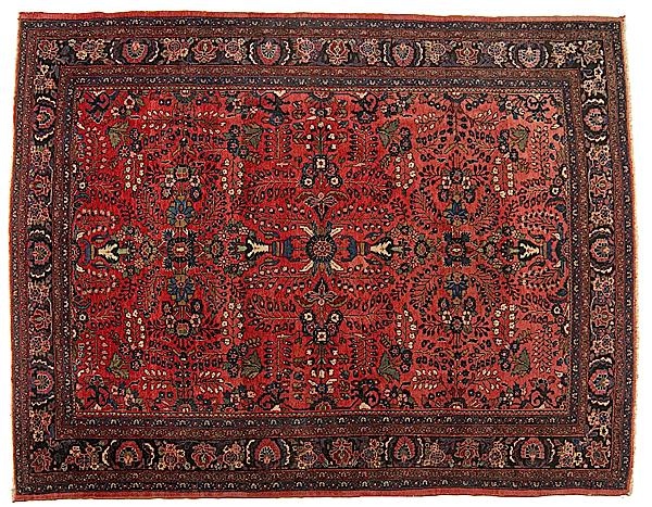 Appraisal: HAMADAN RUG Iran ca deep red ground with symetrical floral