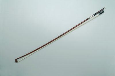 Appraisal: Nurnburger violin bow marked at base Albert Nurnburger round with