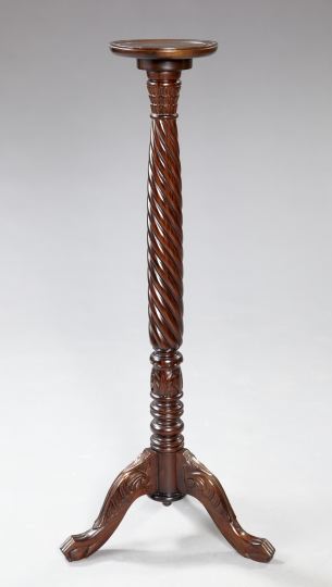 Appraisal: George III-Style Mahogany Torchere the circular dished top raised on