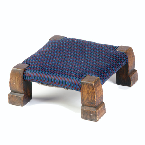 Appraisal: GUSTAV STICKLEY Gout stool with shaped feet recovered in blue