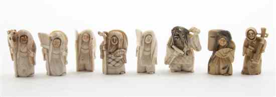 Appraisal: A Group of Eight Ivory Netsukes comprising figural examples with