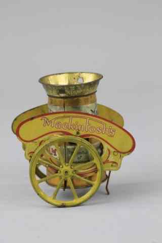 Appraisal: MACKINTOSH TOFFEE MILK CHURN CART England c tinplate chariot lithographed