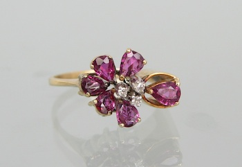 Appraisal: A Ladies' Ruby and Diamond Cluster Ring k yellow gold