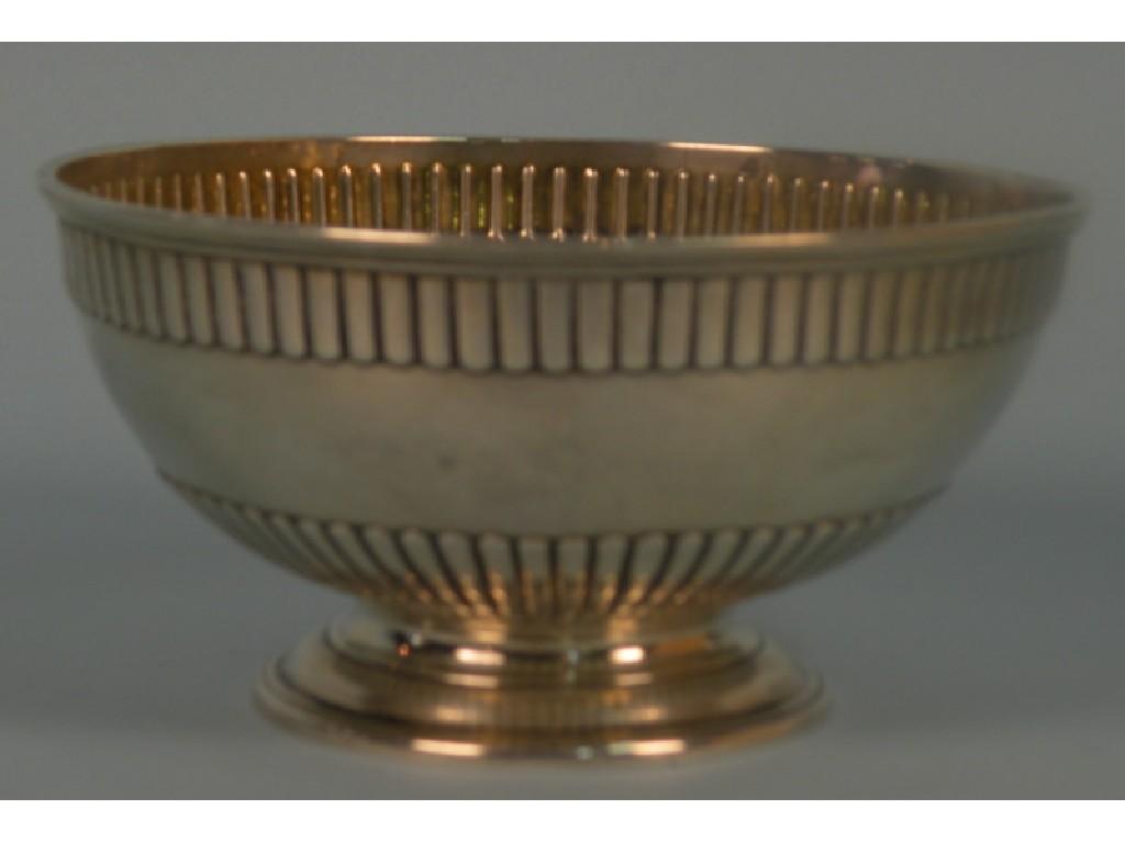 Appraisal: A Victorian silver bowl with parted fluted border on a