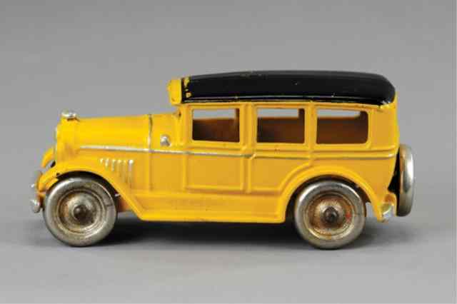 Appraisal: DENT FOUR DOOR SEDAN Cast iron painted in yellow body