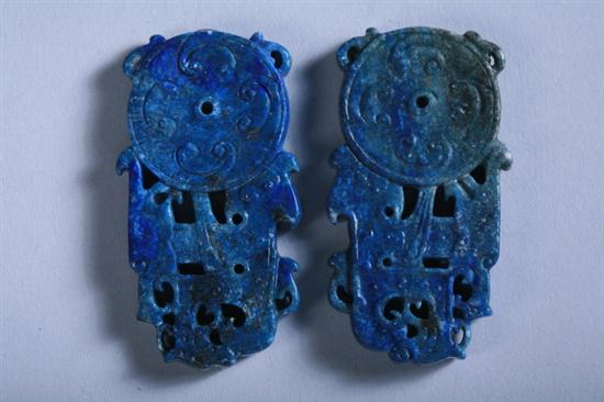 Appraisal: PAIR CHINESE ARCHAISTIC LAPIS LAZULI PENDANTS Carved to depict bi