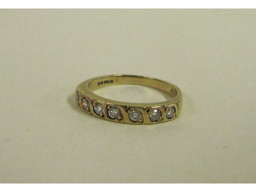 Appraisal: Nine carat gold diamond half hoop ring