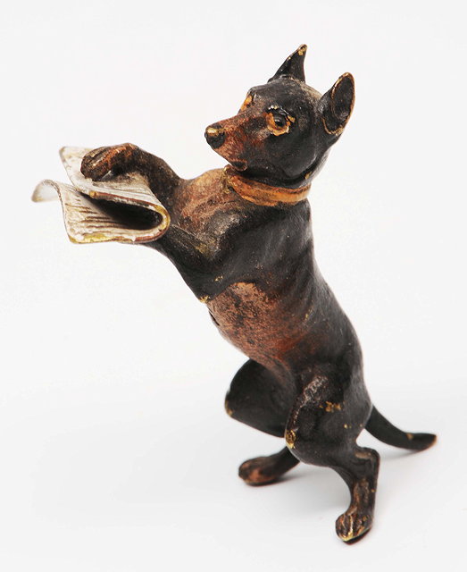 Appraisal: A MINIATURE COLD PAINTED BRONZE FIGURE of a terrior standing