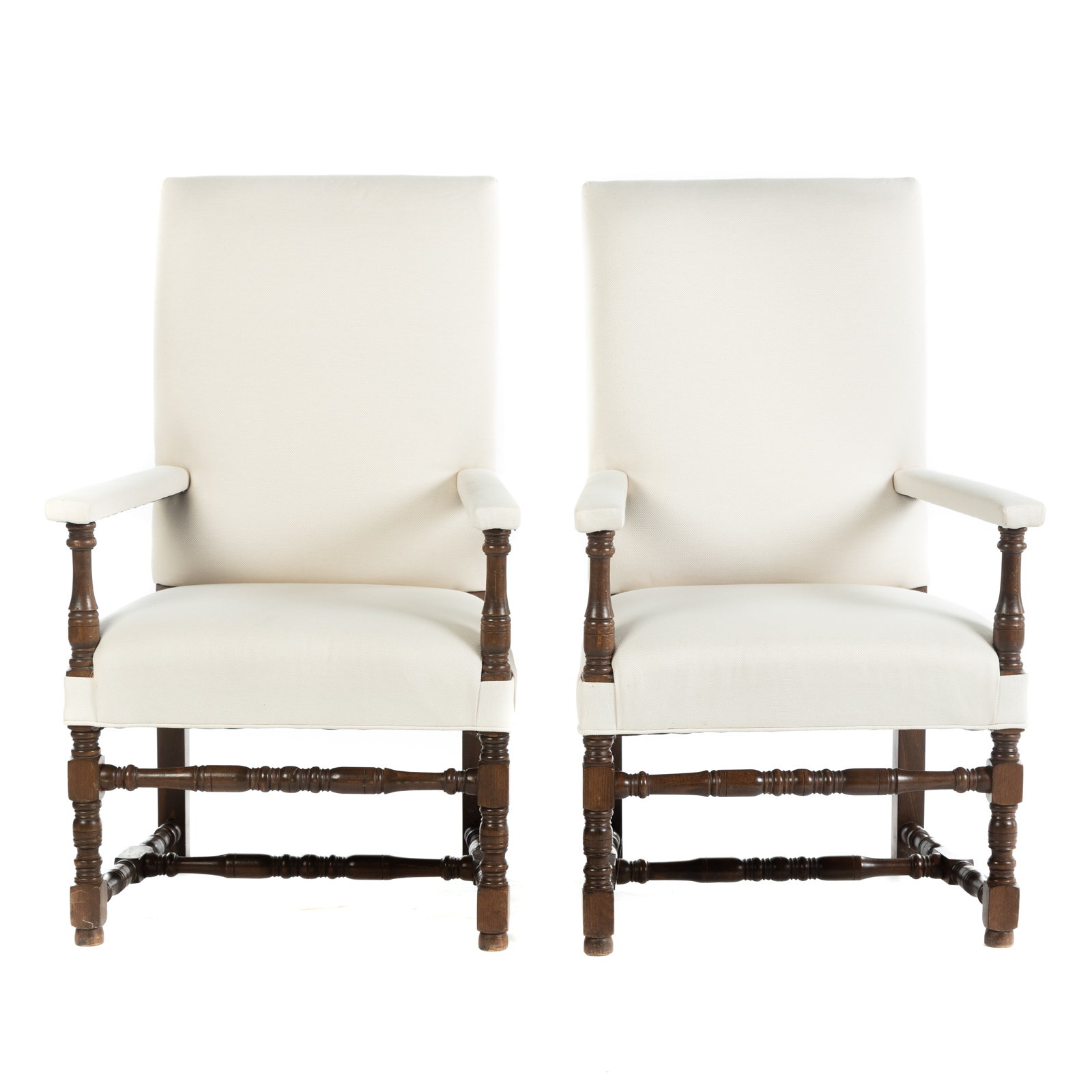 Appraisal: A PAIR OF JACOBEAN STYLE UPHOLSTERED ARMCHAIRS Late th century