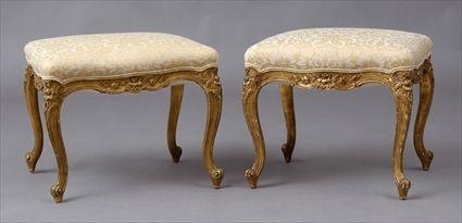 Appraisal: PAIR OF LOUIS XV-STYLE CARVED GILTWOOD TABOURETS Each serpentine seat