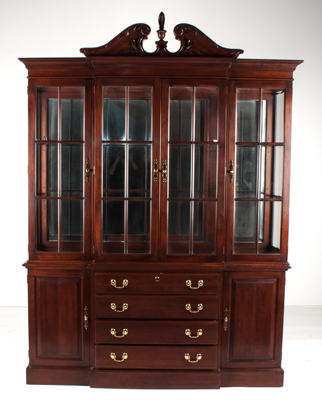 Appraisal: Chippendale style mahogany breakfront four glass panel doors bottom case