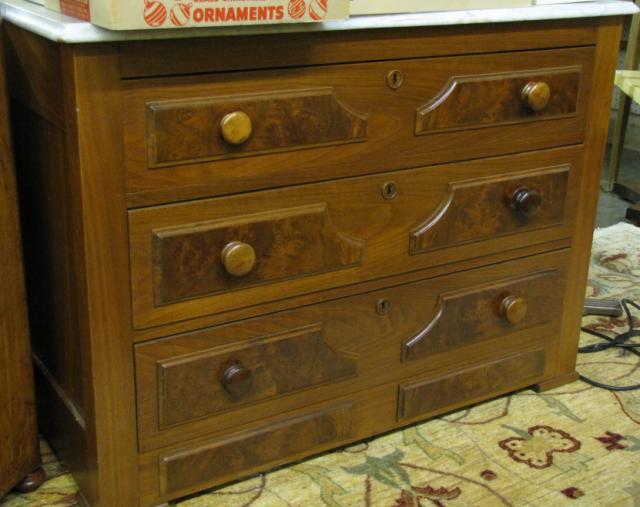 Appraisal: Victorian walnut marble top dresser base with three drawers and